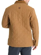 Chaqueta marrón acolchada con patrón de rombos, cuello de pana marrón, cierre con broches metálicos, bolsillos frontales y bolsillo interno. Confeccionada en lana con relleno Thermore de fibras recicladas.