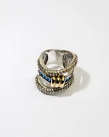 Anillo de plata 925 con doble banda, dublé de oro y zirconias azules y blancas.