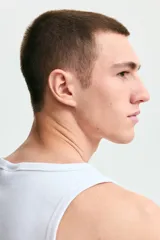 Musculosa de H&M en punto acanalado de mezcla de algodón, con corte ajustado y bajo recto.