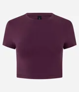 Blusa crop top de manga corta y cuello redondo, color bordó, confeccionada en algodón con elastano.