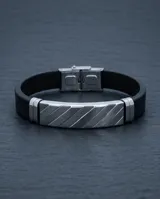 Pulsera de diseño moderno compuesta por una banda central de acero inoxidable con acabado cepillado y detalles en relieve, combinada con una correa de goma negra ajustable.
