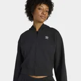 Campera Adidas Originals con capucha, corte cropped y holgado, de color negro, con cierre frontal completo y el logo del trébol bordado en el pecho.