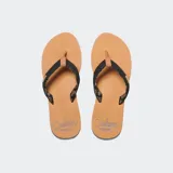 Ojotas Reef Cushion con base color tostado y tiras negras con diseño geométrico.