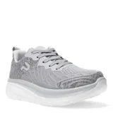 Championes deportivos de tejido de punto en color gris, con diseño de suela gruesa blanca y cierre mediante cordones.