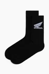 Medias negras de punto fino de mezcla de algodón, con caña alta acanalada y diseño bordado del logo de Honda en el lateral superior.