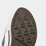 Championes Converse Chuck 70 Low con estampado de piel de serpiente en tonos grises y negros.