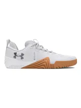 Championes de entrenamiento Under Armour TriBase Reign 6, color blanco con suela de goma color caramelo con efecto moteado. Presentan tecnología UA TriBase para mayor contacto con el suelo, parte superior de malla transpirable y refuerzos estratégicos para estabilidad en levantamientos y movimientos dinámicos.
