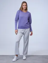 Buzo gris claro de jersey, marca Nanette, con cuello redondo y mangas largas abullonadas con detalle de pinzas en los hombros.