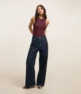 Body color marrón, sin mangas, con cuello halter y cierre en la entrepierna.