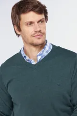 Buzo tejido de algodón con cuello en V, de diseño clásico y liviano, ideal para media estación.