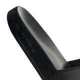 Sandalias tipo ojotas Adidas color negro con el logo del trébol en blanco en la banda superior.
