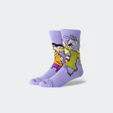 Medias de caña media color lila, con estampado de los personajes de la serie animada Ed, Edd y Eddy. Cuentan con talón y puntera sin costuras para mayor comodidad.