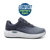 Championes deportivos Joma Atenea Men, color gris con suela blanca. Capellada de piel sintética con perforaciones VTS para ventilación. Plantilla Memory Foam y mediasuela con tecnología Reactive Ball para amortiguación y reactividad. Suela de caucho Durability antideslizante.