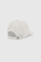 Gorra con visera curva de algodón, con estampado animal print en tonos beige y blanco, y monograma bordado en el frente.