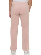 Pantalón de velour color rosa pálido, de corte ancho y cintura con cordón ajustable.