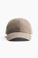 Gorra de sarga de algodón con visera curvada y efecto desgastado.