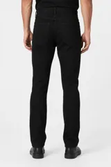 Pantalón jean skinny de tiro bajo y color azul medio.