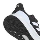 Championes de running Adidas modelo Ultrarun 5 W, color negro con las icónicas tres tiras laterales en blanco y suela de amortiguación blanca.