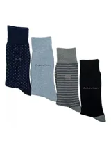 Pack de 4 pares de medias largas de vestir Calvin Klein, con diferentes diseños: azul marino con lunares, celeste liso, gris a rayas horizontales y negro liso.