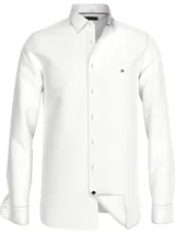 Camisa de manga larga Tommy Hilfiger, confeccionada en algodón regenerativo. Presenta un diseño clásico con cuello abotonado, cierre frontal de botones y el logo de la marca bordado en el pecho.