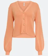 Chaqueta corta de punto color negro, con escote en V, manga larga abullonada, sisa desplazada, abotonado frontal total con botones forrados y puños acanalados.