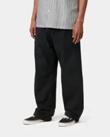 Pantalón Carhartt WIP modelo Walton Pant, color negro de corte amplio y holgado.