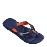 Sandalias tipo ojotas Havaianas modelo Power 2.0, color negro con detalles en rojo. Presentan una suela con textura antideslizante y tiras anchas con diseño geométrico y logo de la marca en relieve.