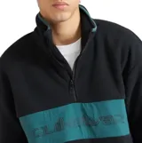 Buzo de polar con cierre frontal parcial, cuello alto y diseño de bloques de color en negro y verde. Presenta el logo de la marca estampado en el pecho.