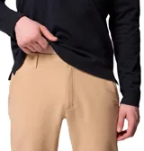 Pantalón Columbia Black Mesa Warm Pant Omni-Shield de corte recto, color beige, con tecnología repelente a líquidos y manchas, bolsillos seguros y detalle reflectante.