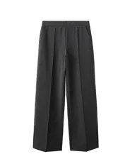 Pantalón de vestir gris oscuro, de corte recto y holgado, con tiro medio y costuras frontales marcadas en las piernas.