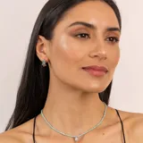 Aros de plata 925 con piedra rectangular de ónix paraiba.