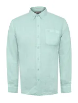 Camisa de manga larga confeccionada en lino orgánico, color verde menta. Presenta cuello clásico, cierre frontal con botones, bolsillo en el pecho con logo bordado y espalda de jersey ligero.