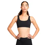 Top deportivo negro de sujeción ligera con cuello en U y tirantes anchos.