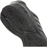 Championes de running Adidas modelo Adistar Control 3, color negro con detalles en gris oscuro. Presentan una estructura de malla transpirable con refuerzos sintéticos laterales y suela de goma resistente.