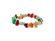 Pulsera de cuentas coloridas de forma irregular alternadas con piezas de metal plateado de diseño orgánico.