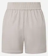 Bermuda runner deportiva Get Over de microfibra ligera color verde lima, con cintura elástica y diseño con textura microperforada.