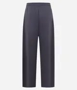 Pantalón de jogging marrón de algodón con forro de polar, corte amplio tipo barrel, cintura elástica con cordón de ajuste y bolsillos laterales.