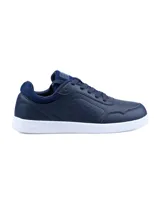 Championes Umbro modelo Max, color azul marino con suela blanca. Presentan detalles de costuras y el logo de Umbro grabado en el lateral.