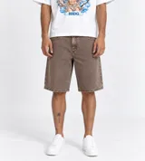 Bermuda baggy de jean color marrón con efecto pigmentado y diseño de corte holgado estilo clásico de cinco bolsillos.