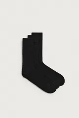 Pack de tres pares de medias de algodón, diseño liso con puño elástico acanalado.