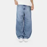 Pantalón de jean con corte ultra baggy, de tiro medio y pierna ancha. Presenta un lavado clásico en tono azul medio y costuras reforzadas.