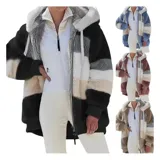 Campera peluda de mujer marca United Uy, con capucha y cierre frontal de cremallera. Presenta diseño de rayas horizontales en bloques de colores blanco, gris, beige y negro, con textura de piel sintética y puños elásticos.