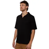 Chomba O'Neill modelo Polo Bodhi de manga corta, color negro, con cuello polo y escote en V sin botones. Confeccionada en tejido de punto con textura de rayas verticales sutiles.