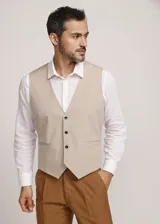 Chaleco reversible Due Volti de corte sastrero, con diseño a cuadros en tonos de gris y cierre frontal con cuatro botones oscuros.