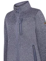 Campera polar de cierre completo con cuello alto, confeccionada en tejido de punto jaspeado. Presenta un bolsillo vertical con cierre en el pecho y dos bolsillos laterales con cierre. Diseño de calce regular y manga larga.