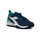 Championes de tenis Diadora modelo Blushield Torneo 2 AG, color azul marino con detalles en verde, blanco y gris. Presentan el logo de la marca en los laterales y tecnología Blushield para mayor amortiguación y estabilidad.