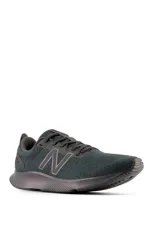 Championes de running New Balance 430 de color gris, con diseño aerodinámico, cordones tono sobre tono y la icónica "N" de la marca en el lateral.