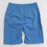 Short deportivo color verde agua, de tiro alto y corte ajustado, con frunce en la parte trasera.