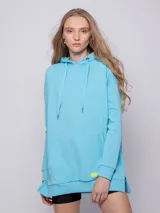 Canguro blanco oversize con capucha, cordones y bolsillo tipo canguro.