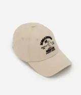 Gorra de sarga color beige con bordado negro de Demogorgon, personaje de la serie Stranger Things.